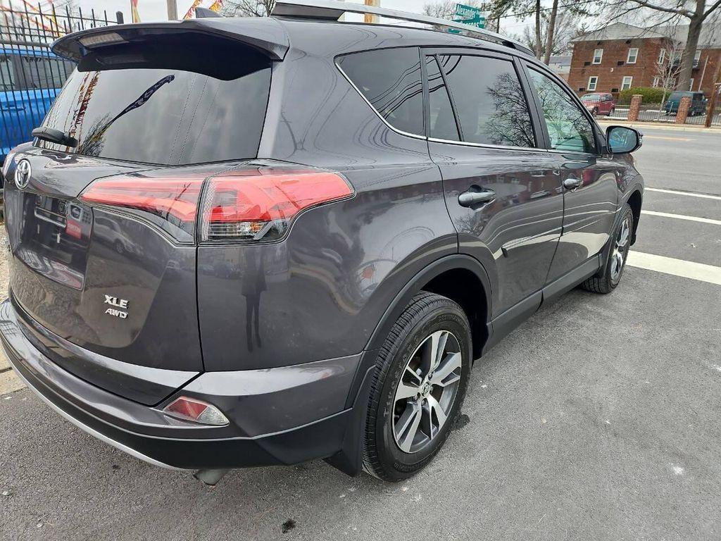 used 2018 Toyota RAV4 car, priced at $13,999