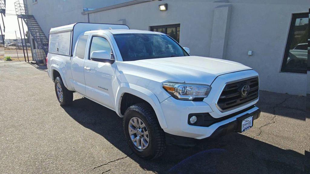 used 2018 Toyota Tacoma car, priced at $21,697