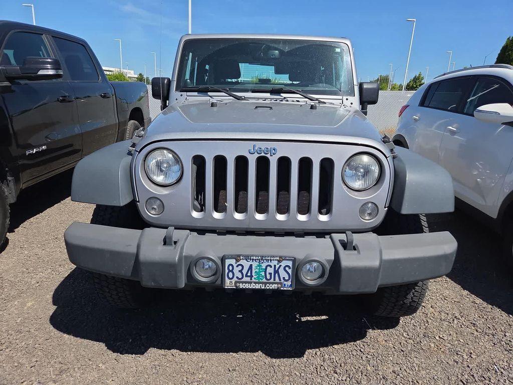 used 2014 Jeep Wrangler car, priced at $18,998