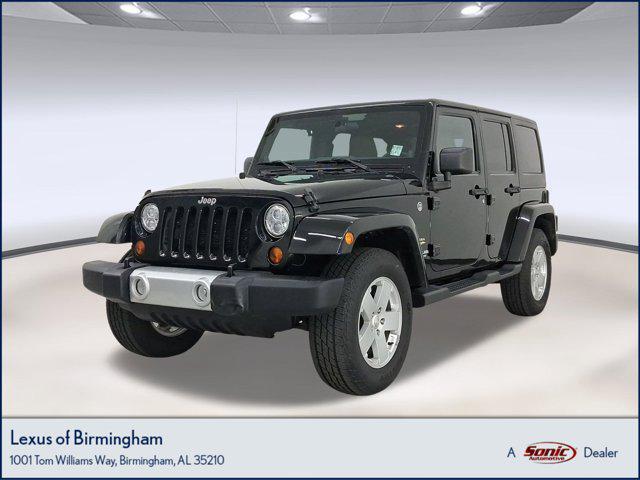 used 2012 Jeep Wrangler Unlimited car, priced at $15,499