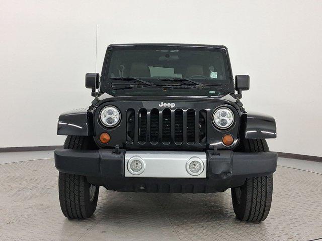 used 2012 Jeep Wrangler Unlimited car, priced at $15,499