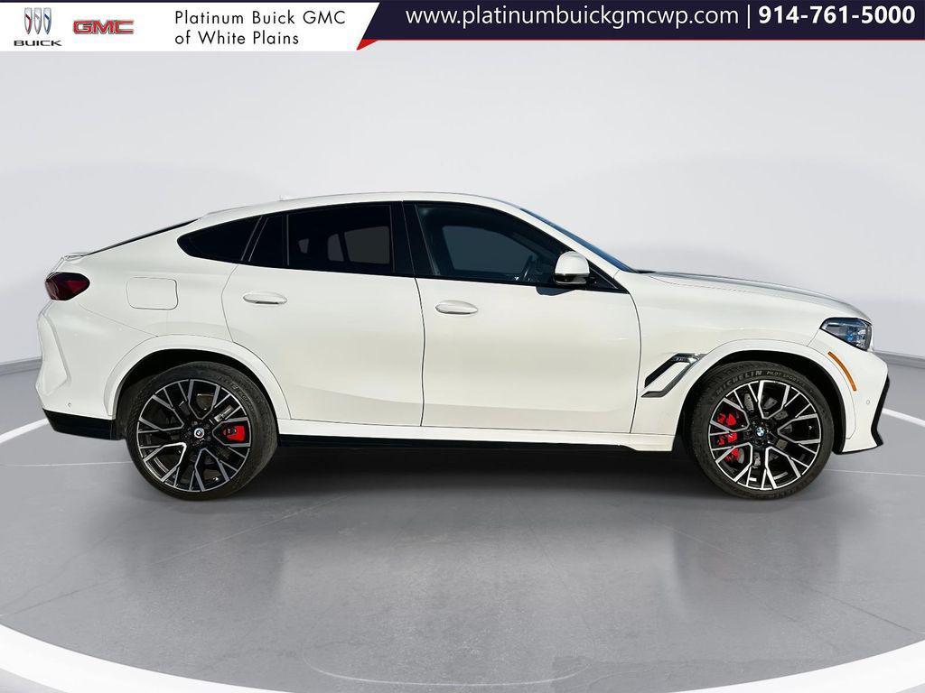 used 2023 BMW X6 M car, priced at $85,378