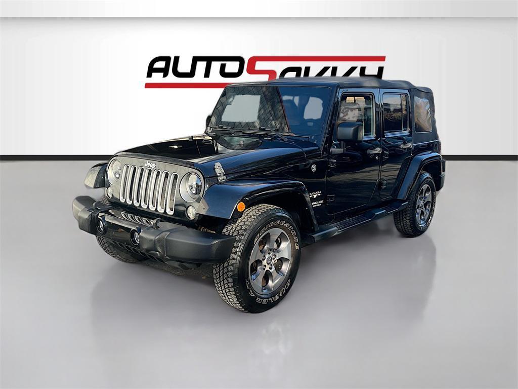used 2016 Jeep Wrangler Unlimited car, priced at $15,500
