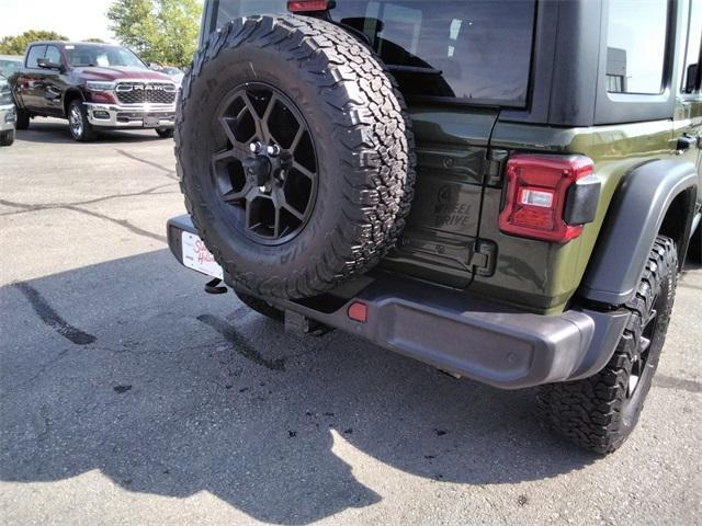 used 2024 Jeep Wrangler car, priced at $33,994