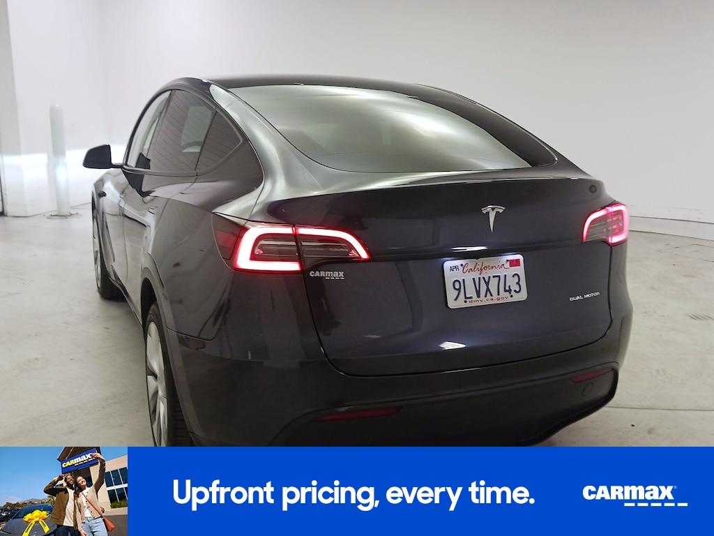used 2024 Tesla Model Y car, priced at $34,998