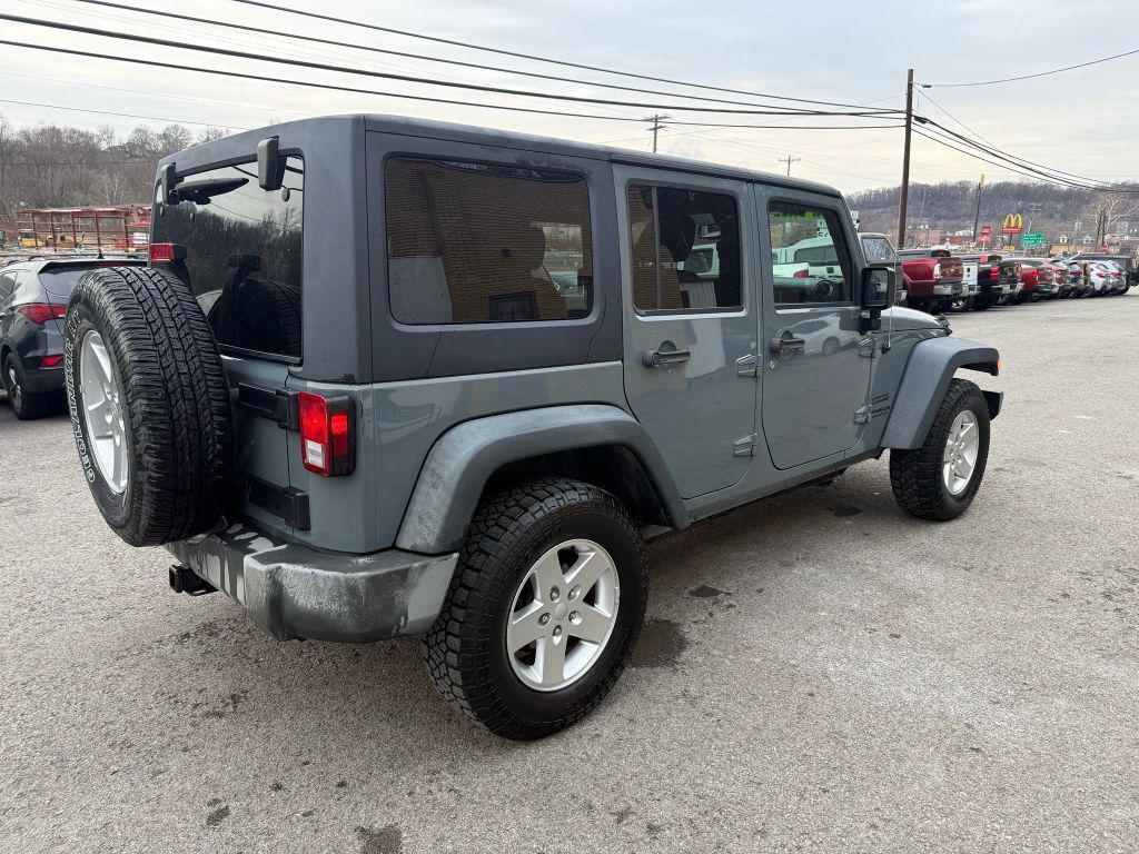 used 2015 Jeep Wrangler Unlimited car, priced at $14,395