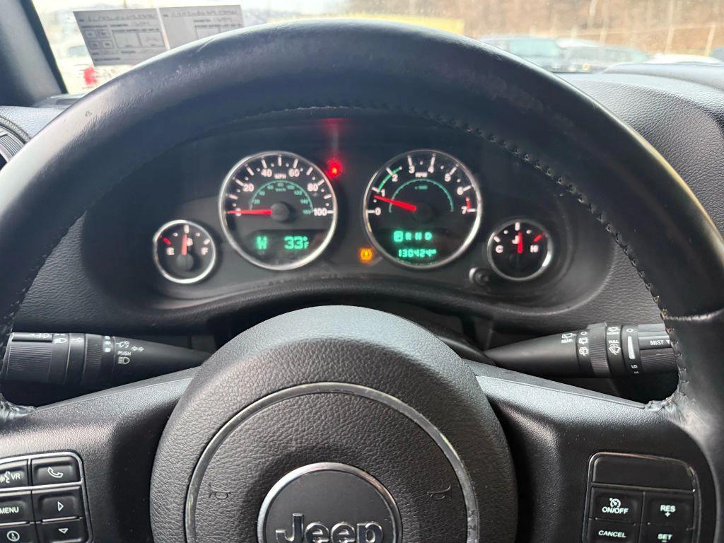 used 2015 Jeep Wrangler Unlimited car, priced at $14,395