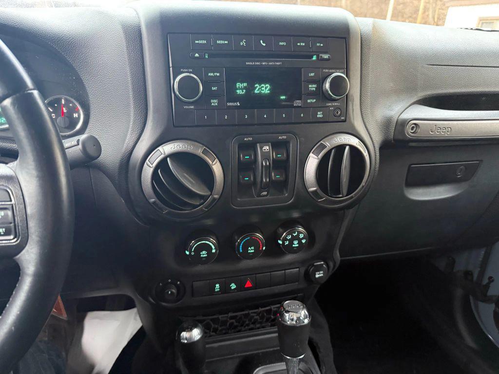 used 2015 Jeep Wrangler Unlimited car, priced at $14,395