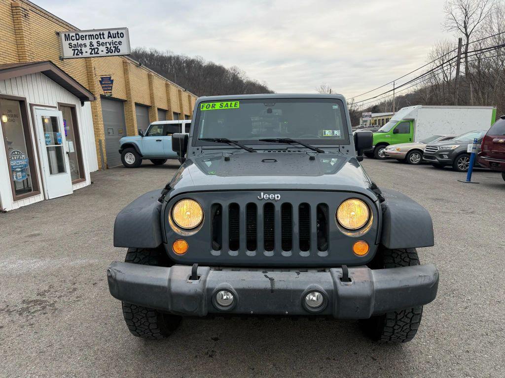 used 2015 Jeep Wrangler Unlimited car, priced at $14,395