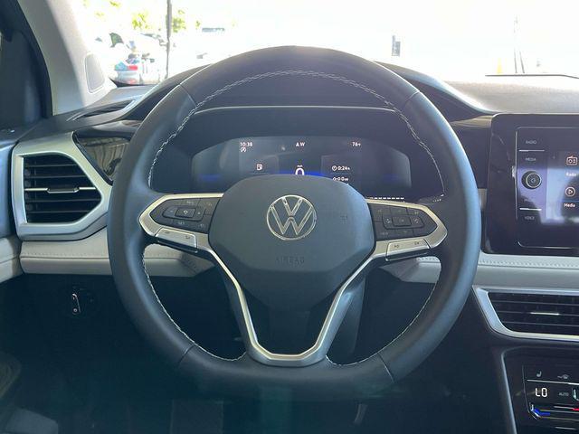 new 2025 Volkswagen Taos car, priced at $21,998