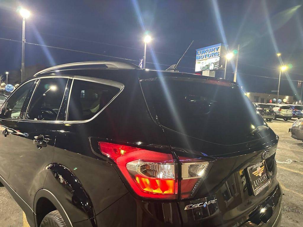 used 2018 Ford Escape car, priced at $12,317