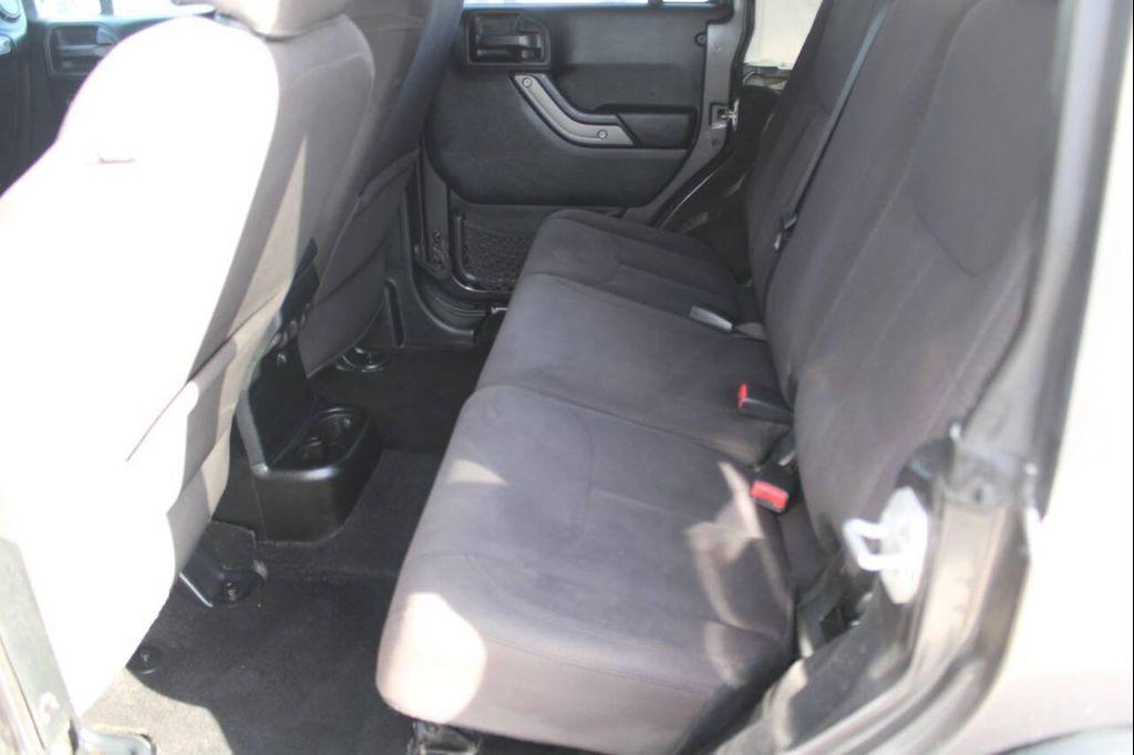 used 2018 Jeep Wrangler JK Unlimited car, priced at $16,900