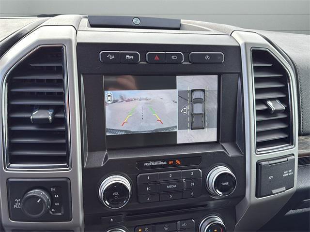 used 2018 Ford F-150 car, priced at $23,074