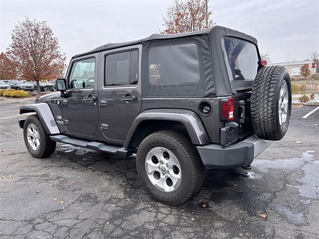used 2014 Jeep Wrangler Unlimited car, priced at $13,447