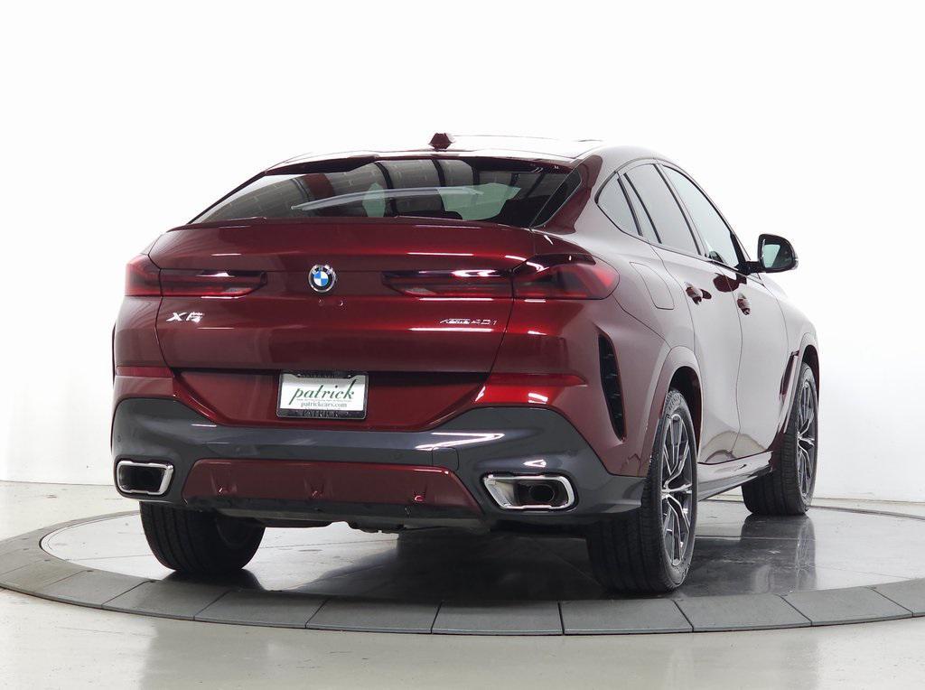 used 2025 BMW X6 car, priced at $66,900