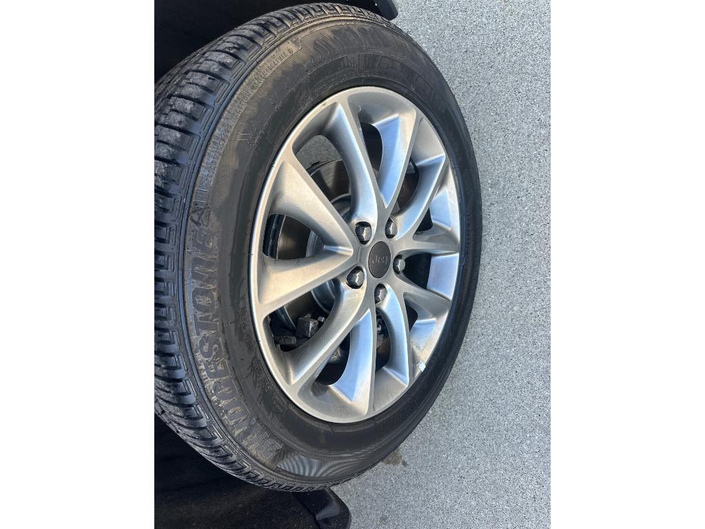 used 2021 Jeep Grand Cherokee car, priced at $20,000