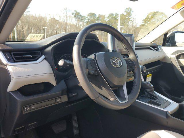 used 2023 Toyota RAV4 car, priced at $29,999