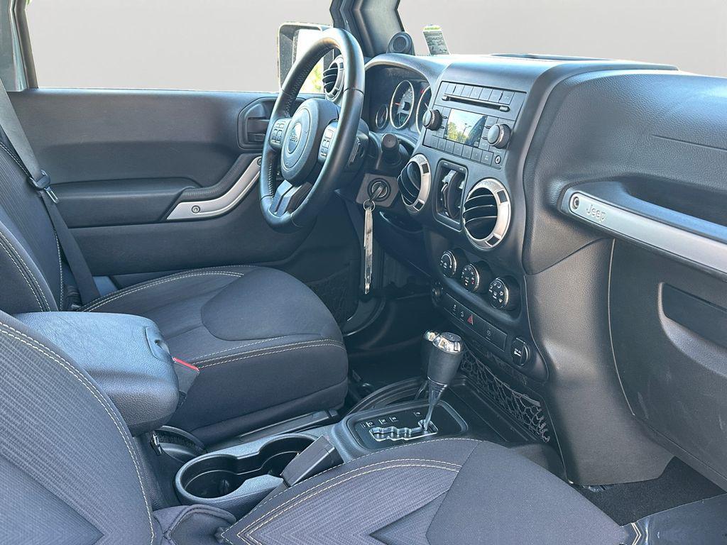 used 2014 Jeep Wrangler Unlimited car, priced at $20,779