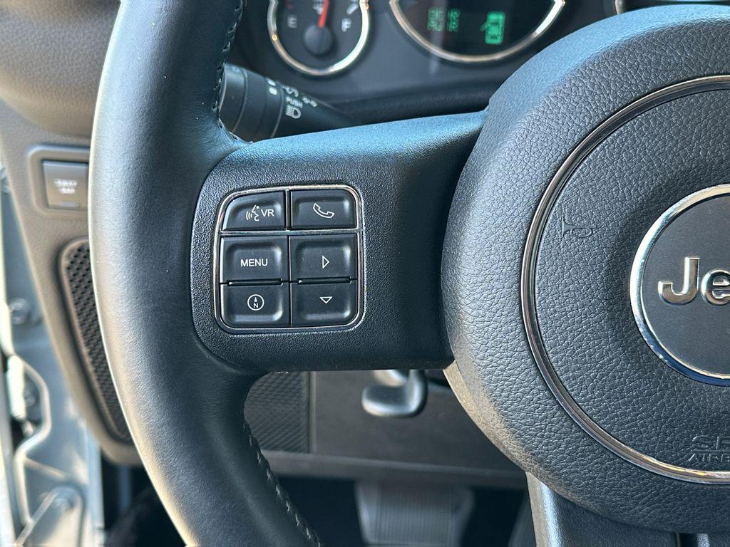 used 2014 Jeep Wrangler Unlimited car, priced at $20,779