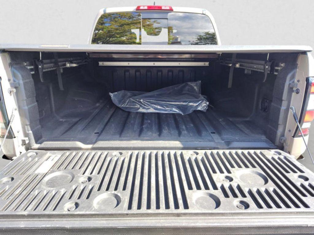 used 2024 Nissan Frontier car, priced at $37,995