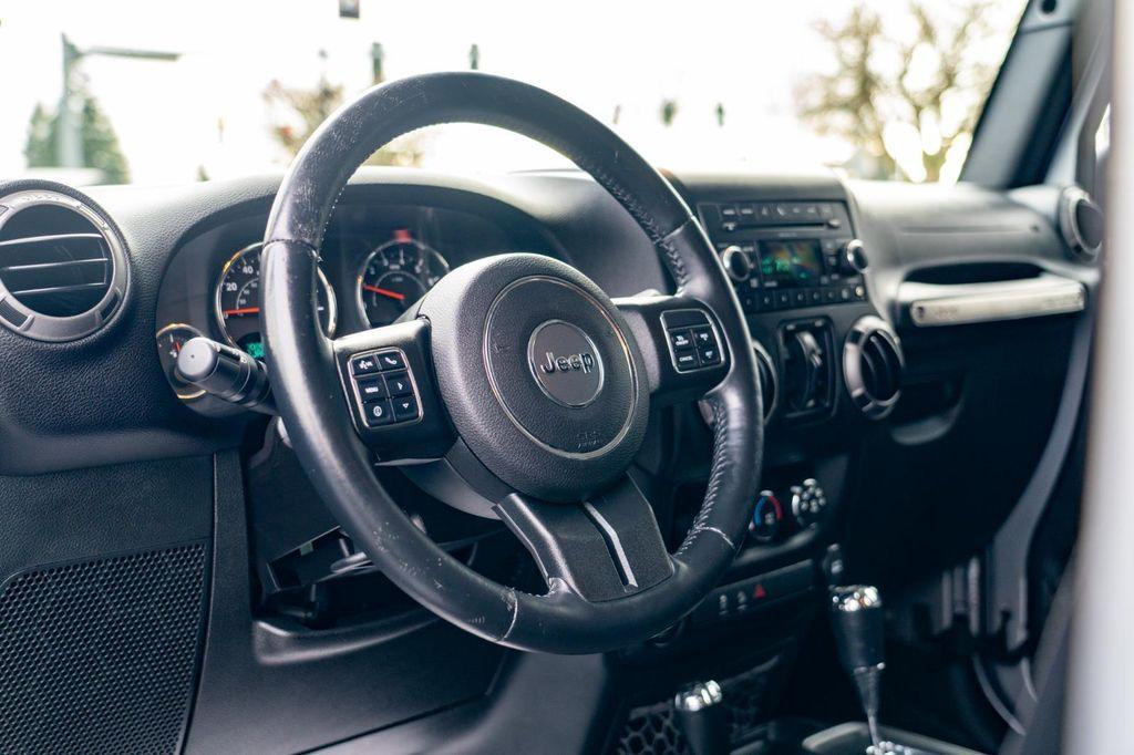 used 2015 Jeep Wrangler Unlimited car, priced at $18,697