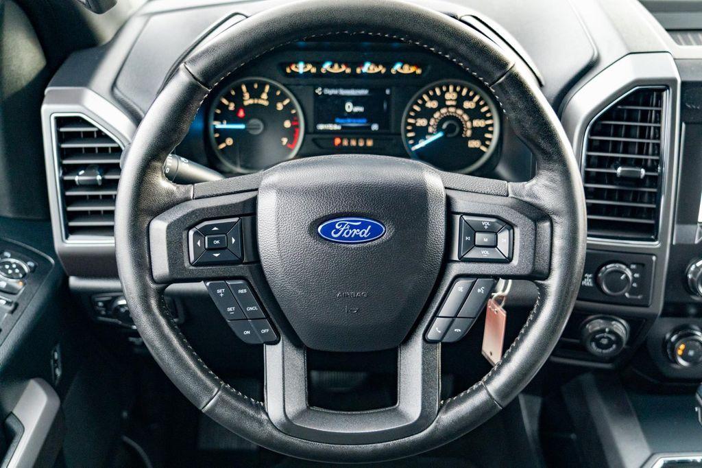 used 2019 Ford F-150 car, priced at $26,597