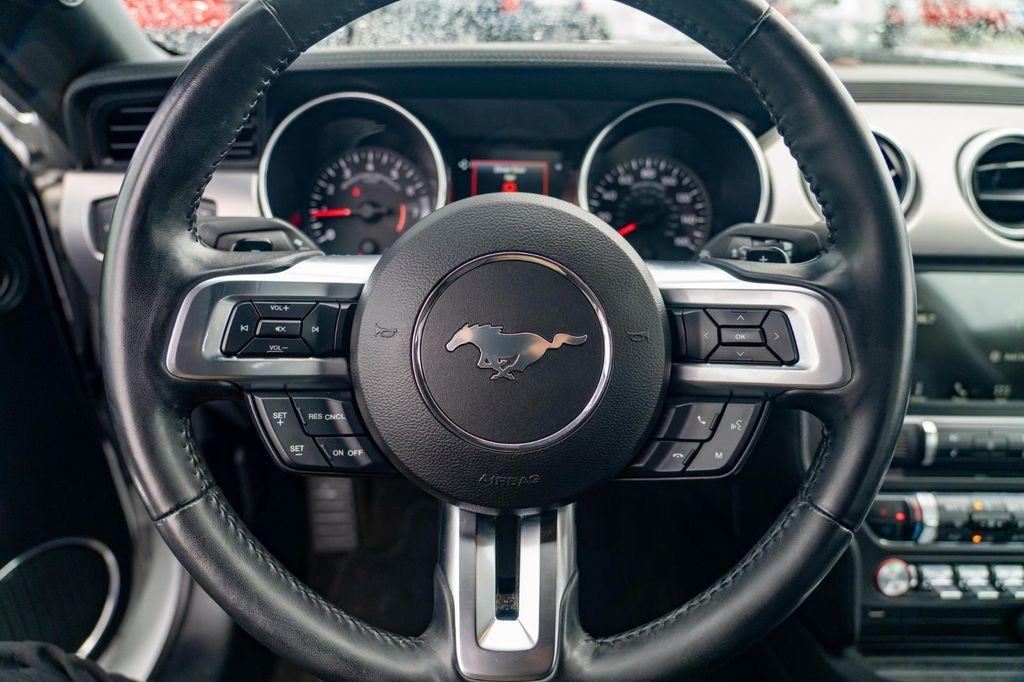 used 2018 Ford Mustang car, priced at $21,297