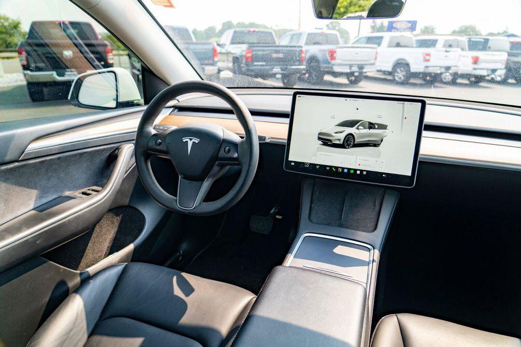 used 2023 Tesla Model Y car, priced at $27,697
