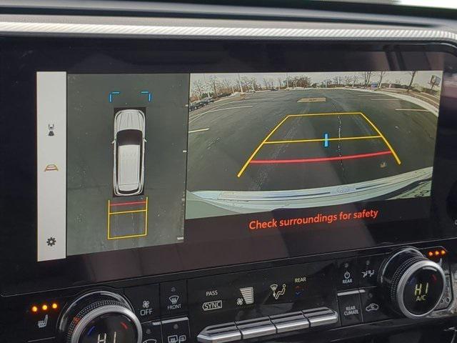 used 2025 Toyota Highlander Hybrid car, priced at $54,900