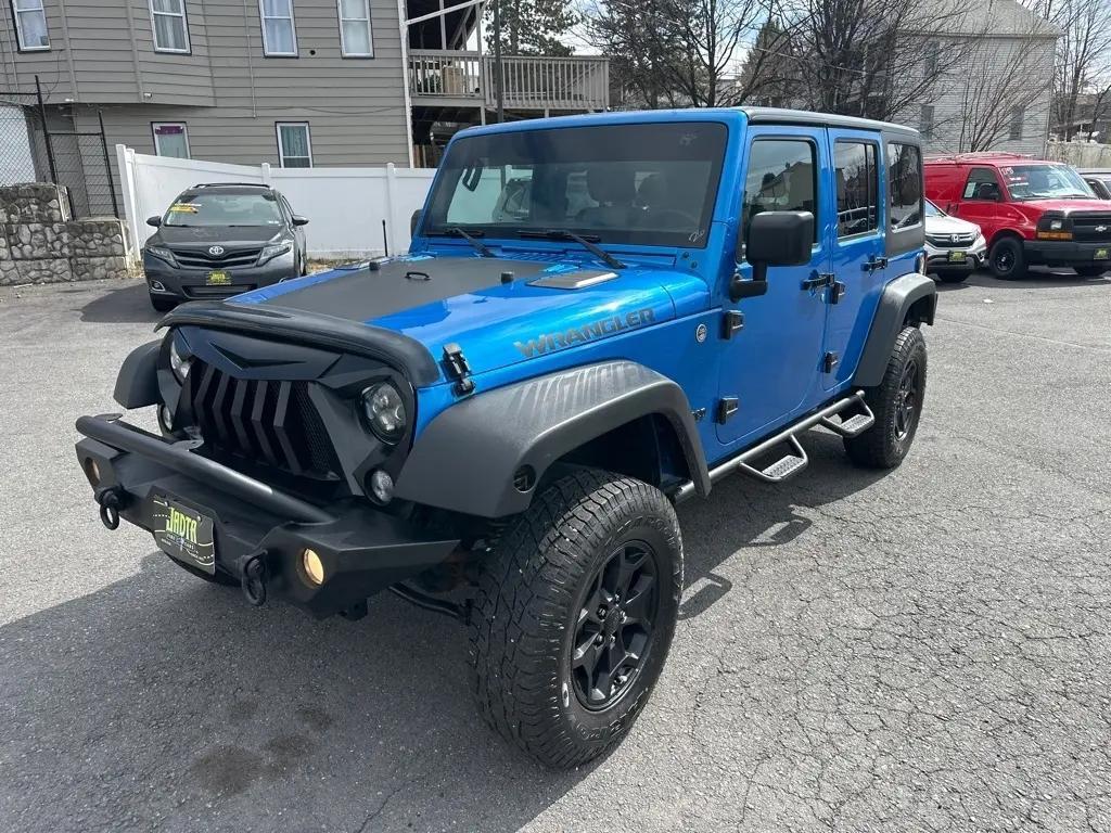 used 2015 Jeep Wrangler Unlimited car, priced at $17,209
