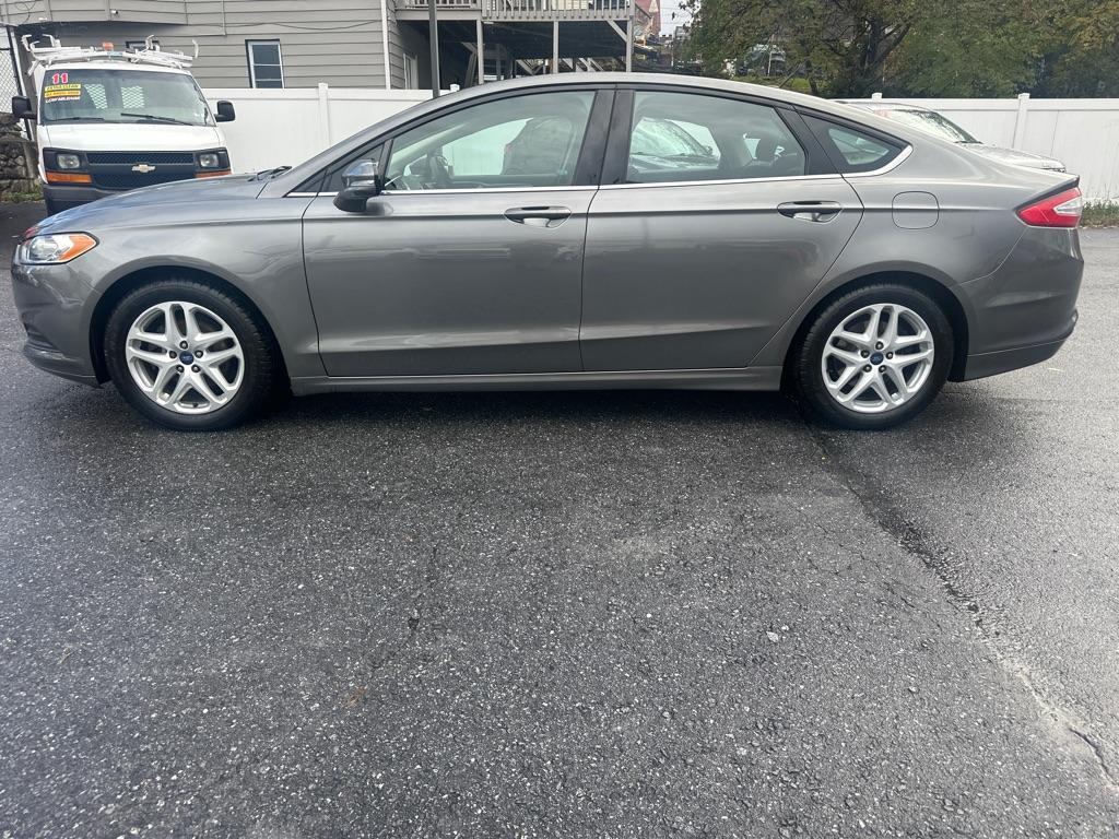 used 2014 Ford Fusion car, priced at $6,200
