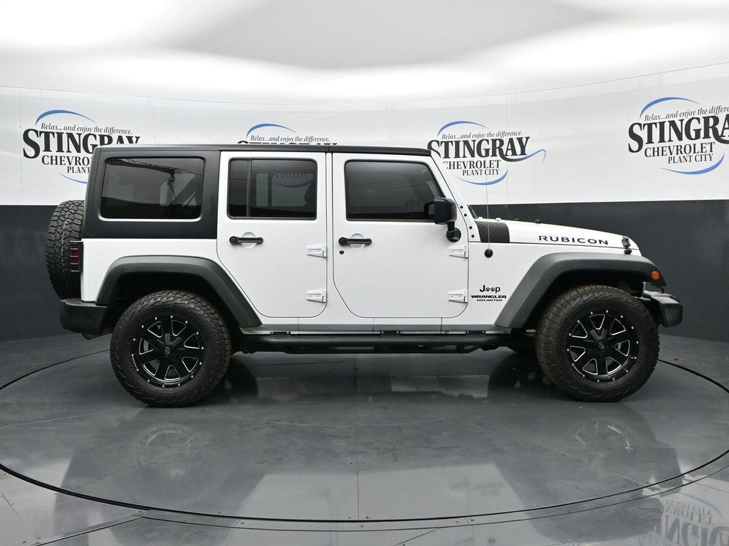used 2015 Jeep Wrangler Unlimited car, priced at $19,725