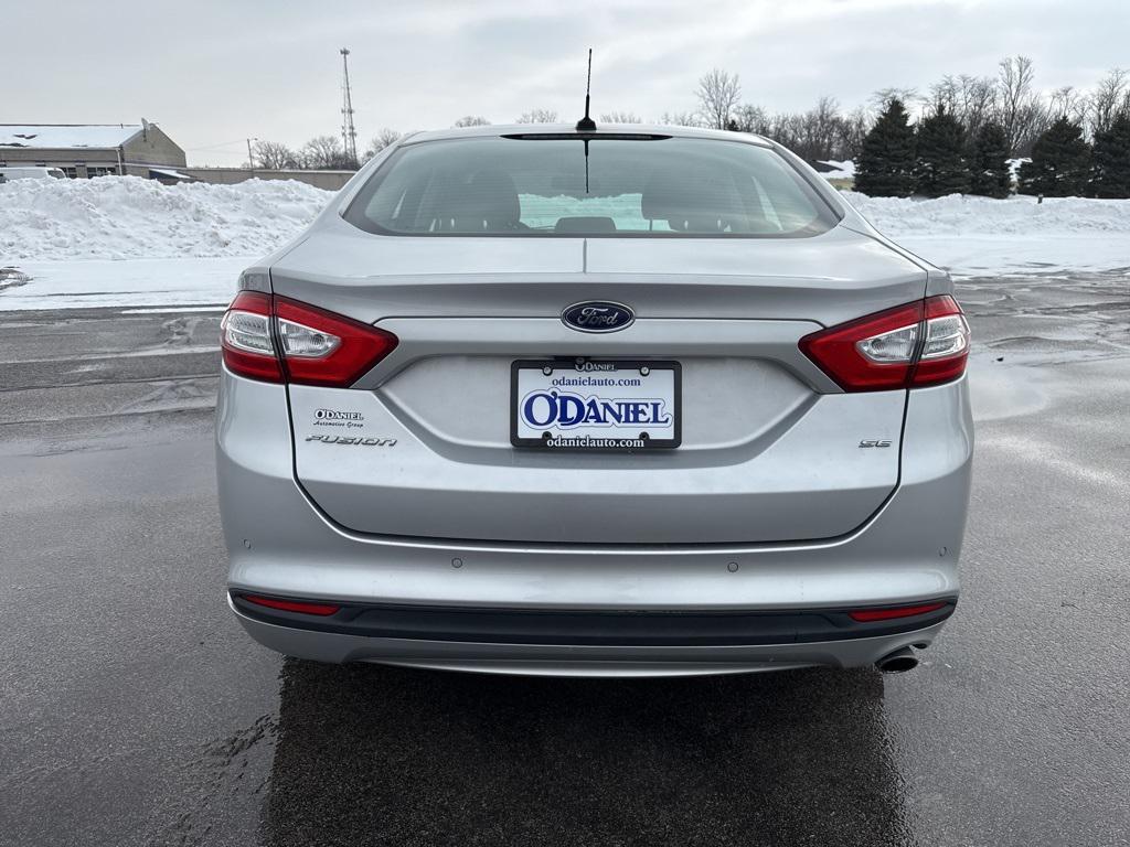 used 2015 Ford Fusion car, priced at $10,000