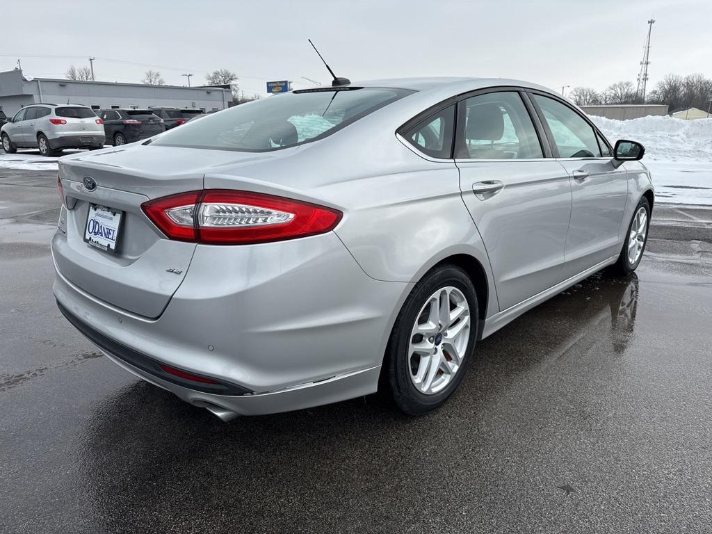 used 2015 Ford Fusion car, priced at $10,000