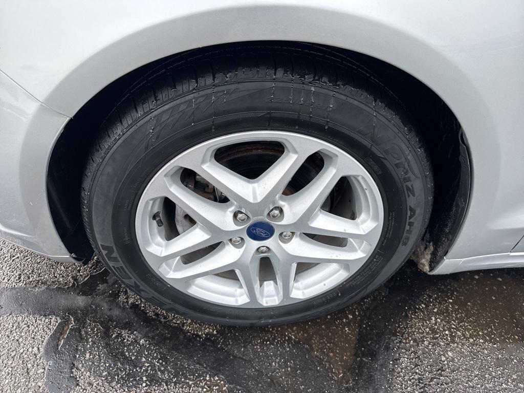 used 2015 Ford Fusion car, priced at $10,000