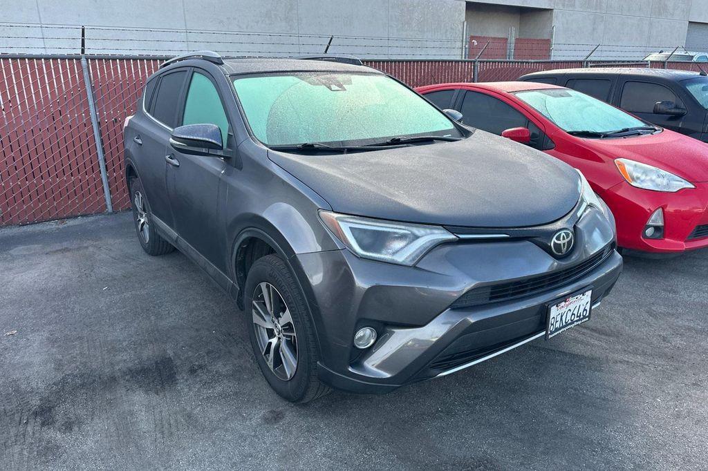 used 2018 Toyota RAV4 car, priced at $13,700