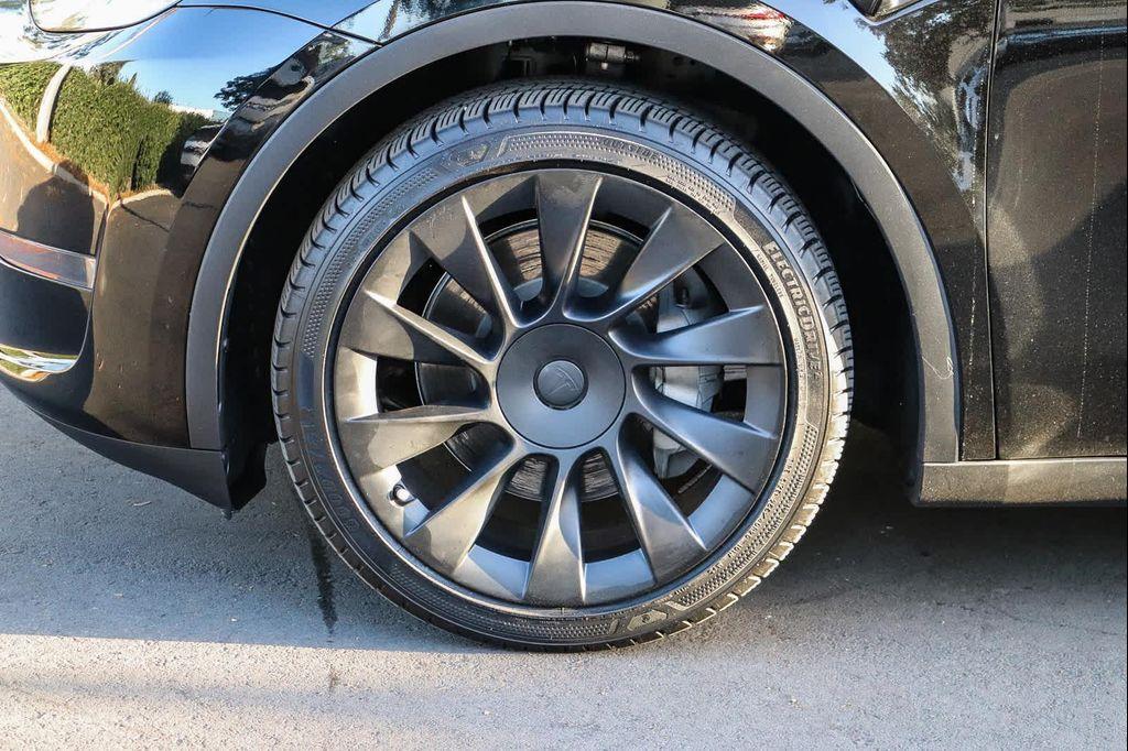 used 2024 Tesla Model Y car, priced at $32,581