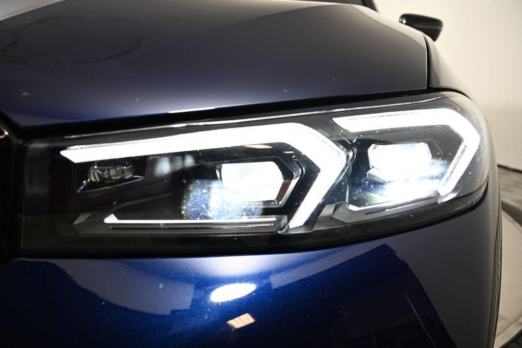 used 2023 BMW 330e car, priced at $37,000