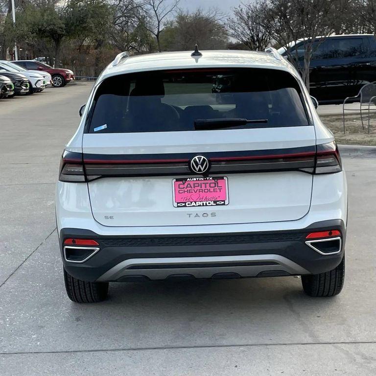 used 2025 Volkswagen Taos car, priced at $23,118