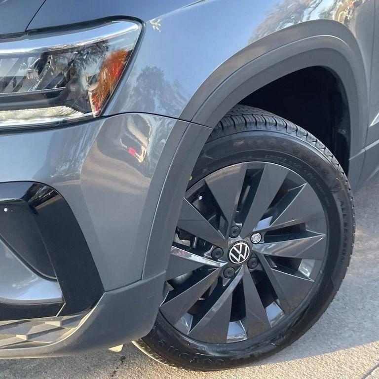 used 2024 Volkswagen Taos car, priced at $16,827