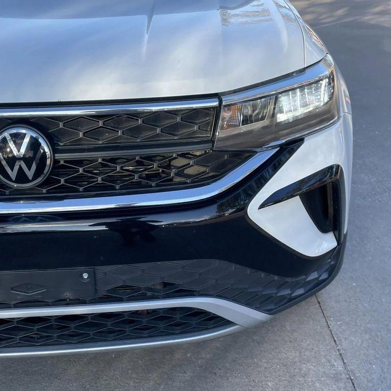 used 2024 Volkswagen Taos car, priced at $18,358