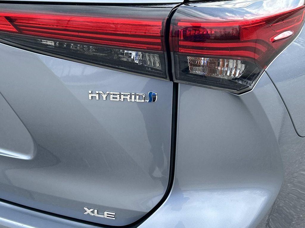used 2021 Toyota Highlander Hybrid car, priced at $29,707