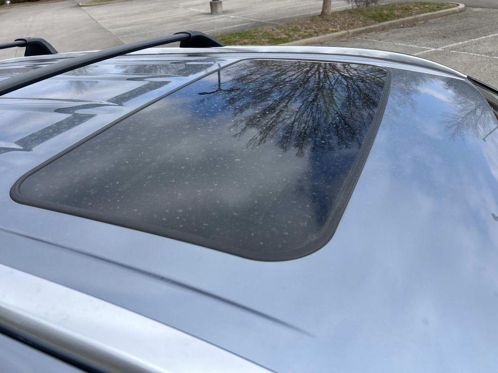 used 2021 Toyota Highlander Hybrid car, priced at $29,707