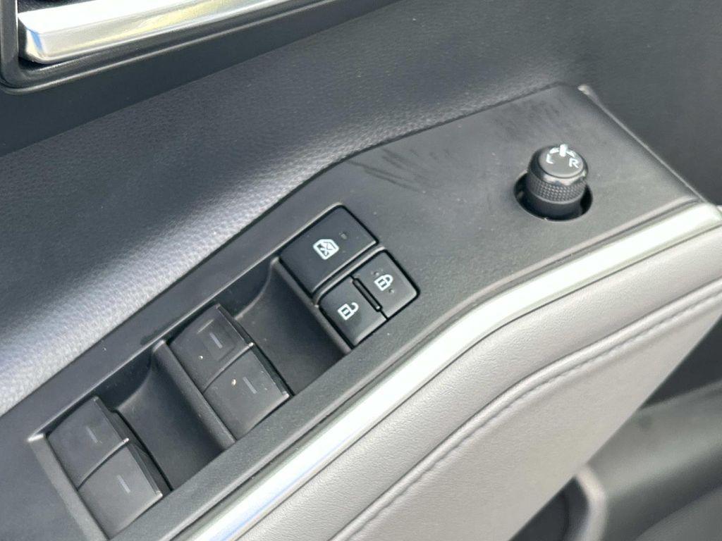 used 2021 Toyota Highlander Hybrid car, priced at $29,707