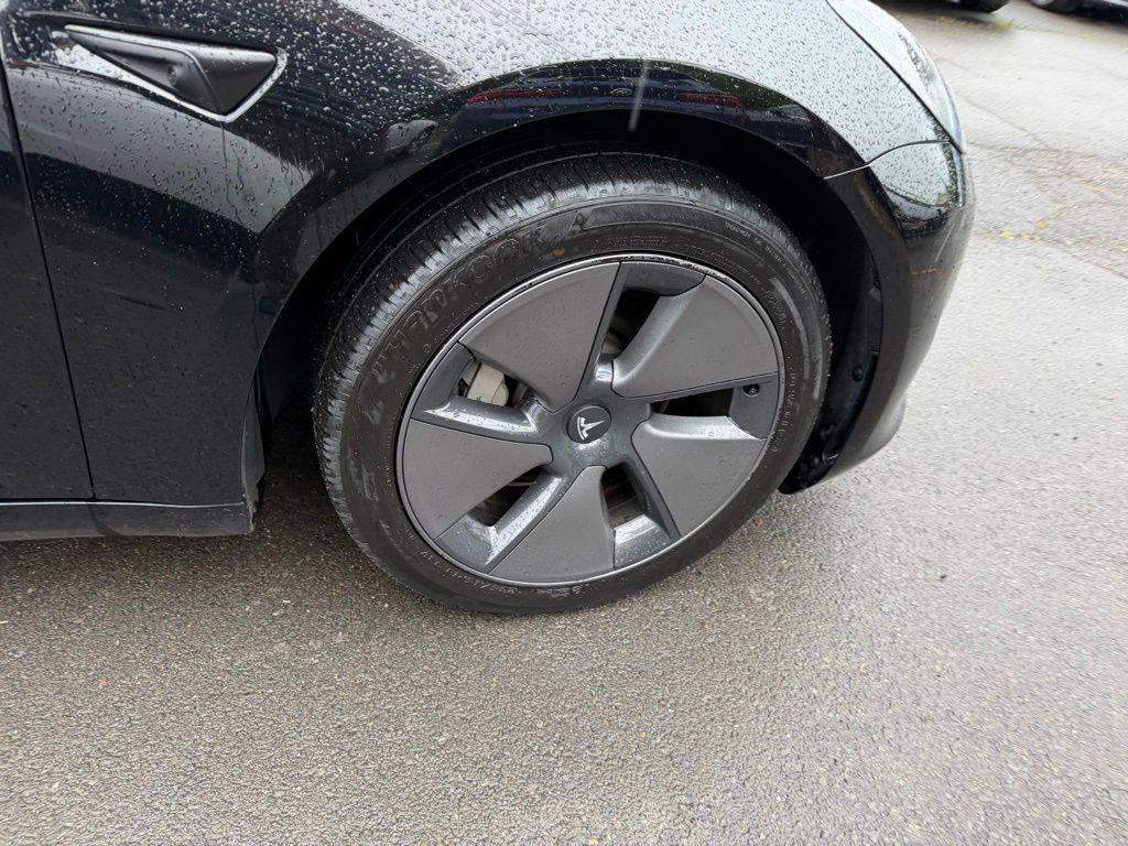 used 2023 Tesla Model 3 car, priced at $30,495