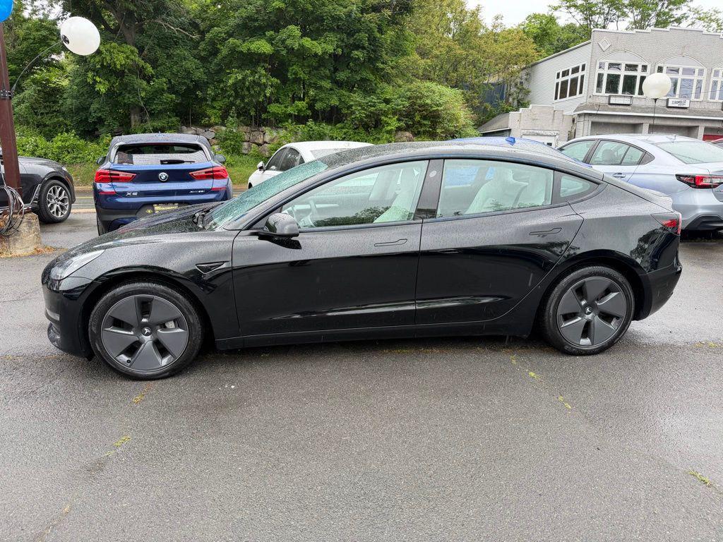used 2023 Tesla Model 3 car, priced at $30,495