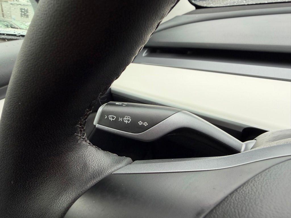 used 2023 Tesla Model 3 car, priced at $30,495
