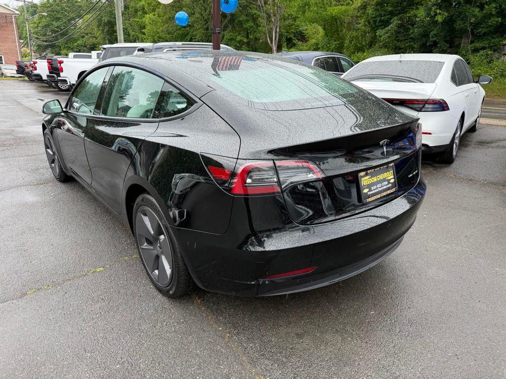 used 2023 Tesla Model 3 car, priced at $30,495