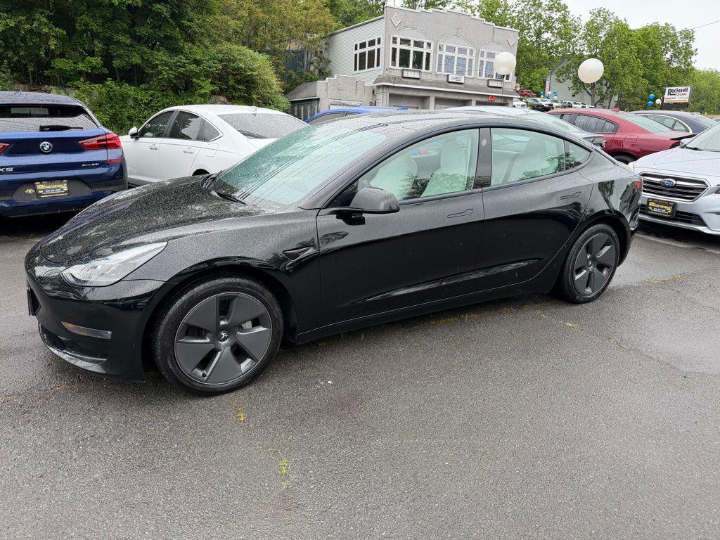 used 2023 Tesla Model 3 car, priced at $30,495