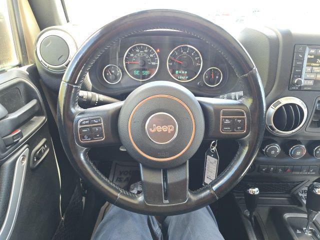 used 2017 Jeep Wrangler Unlimited car, priced at $25,174